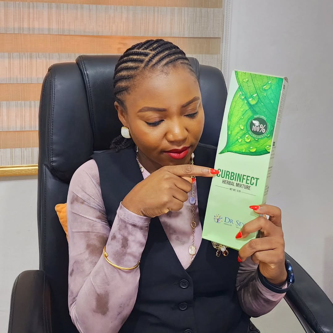 Dr. Oluwaseyi Adebayo with Curbinfect Herbal Mixture